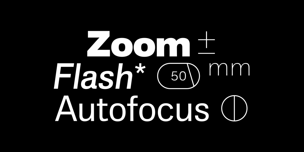 Die Wörter Zoom, Flash und Autofocus, gesetzt in der Schrift Album Sans, umgeben von einigen Zeichen zeigen den Character der Schrift.